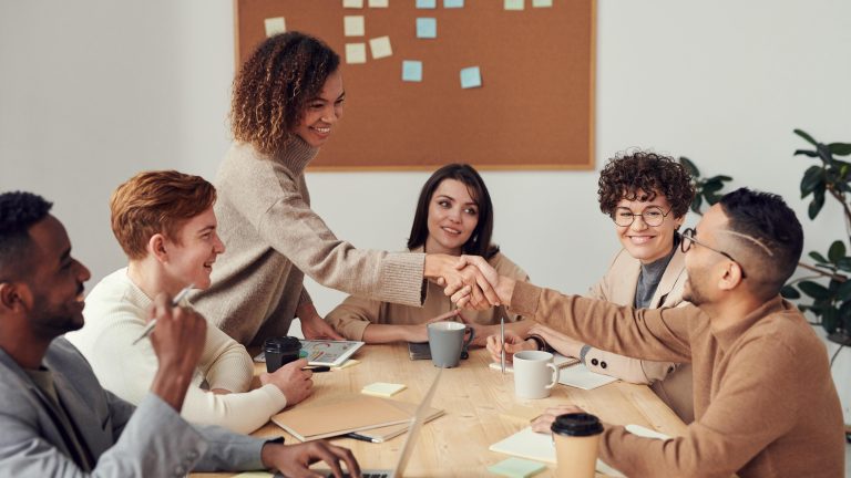 Shaking hands in a business partnership deal.